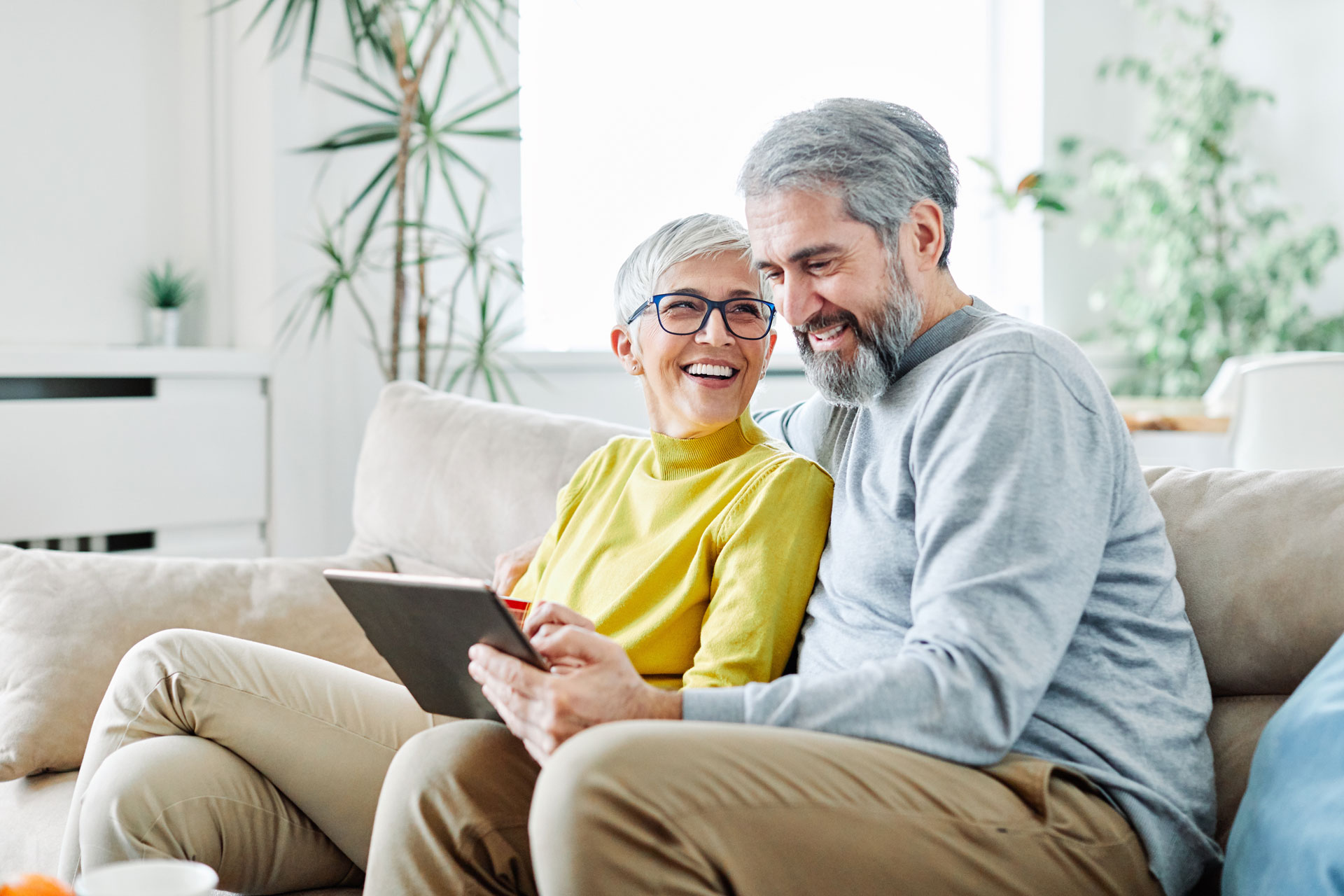Couple looking at tablet