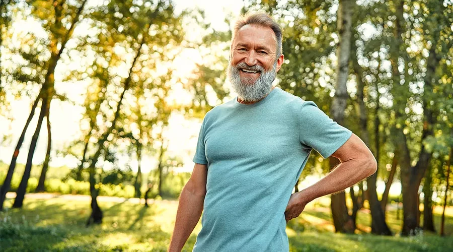 A man smiling outside