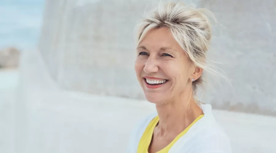 Woman outside smiling