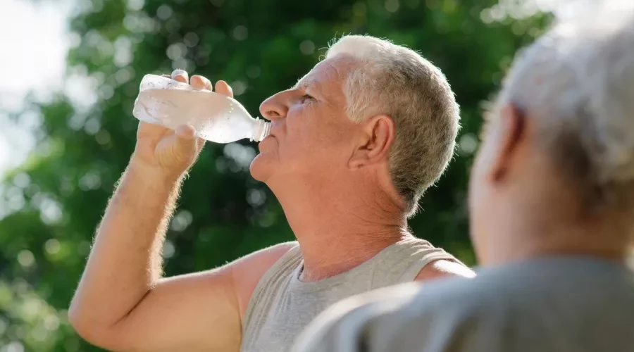 man drinking water