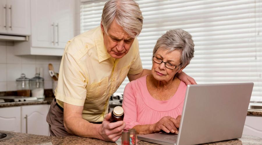 husband and wife researching supplements 