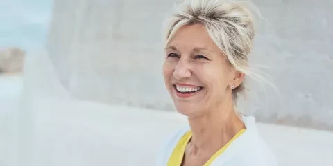 Woman outside smiling