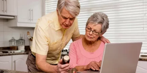 husband and wife researching supplements 